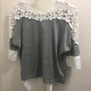 grey and white shirt